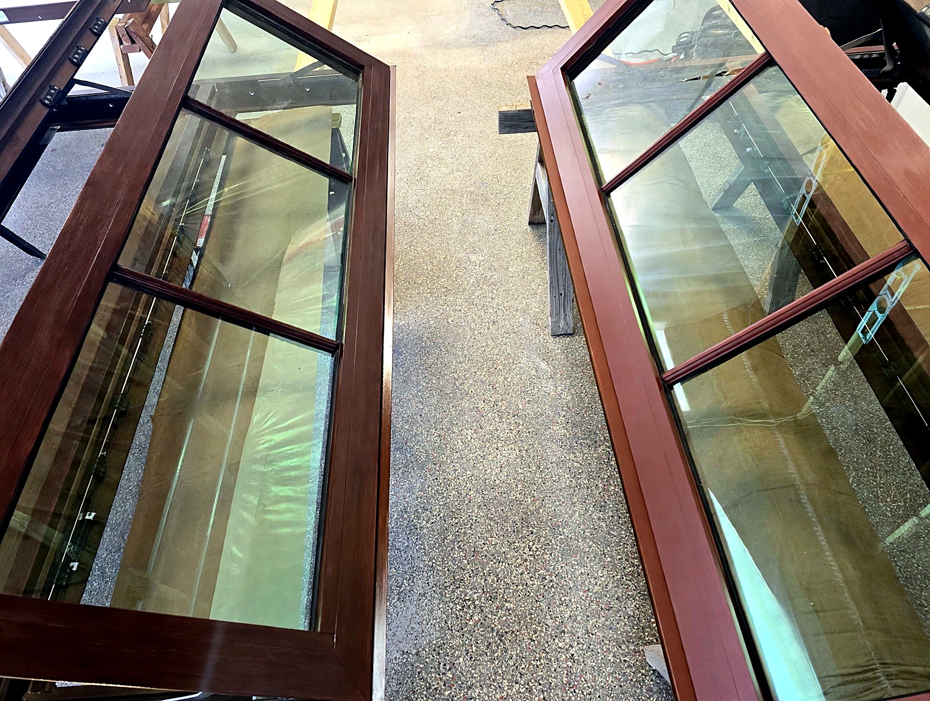Window frames completed with a hand-painted faux wood finish