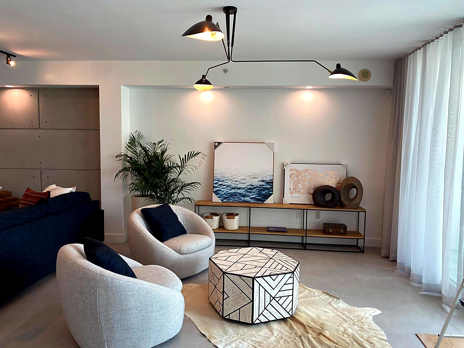 Living room with dimensional concrete-look microcement panels